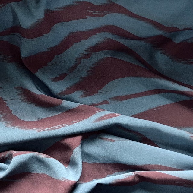 100% viscose print with red-blue landscape stripes | View: super nice, soft 100% viscose print with red-blue landscape stripes