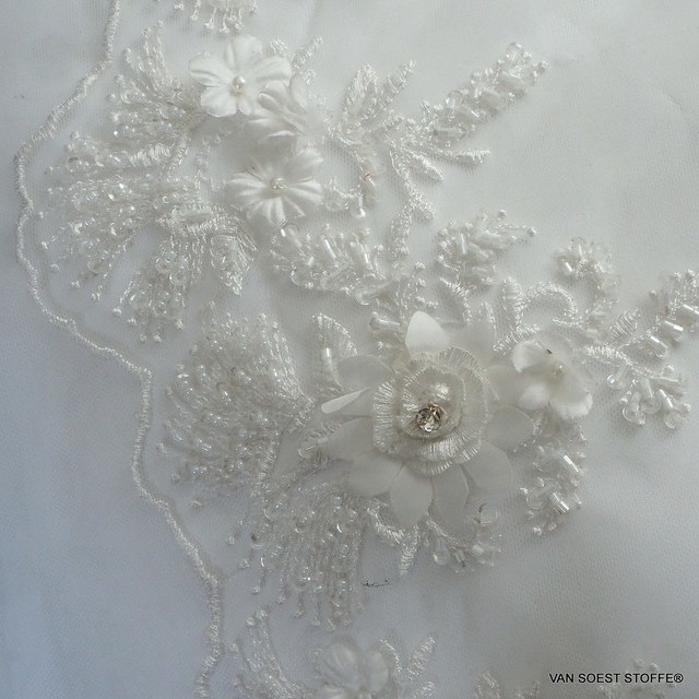 3D-lace with stabs-pearls and mini sequins tone in tone in white