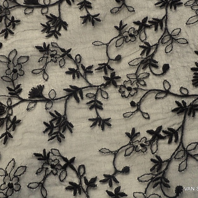 Allover flower lace on black organza. | View: Allover flower lace on black organza.