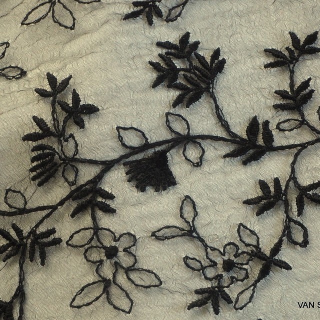 Allover flower lace on black organza. | View: Allover flower lace on black organza.