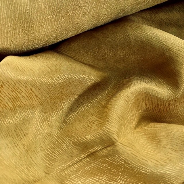 Tree bark crepe satin in 60% cupro - 40% lyocell in mustard