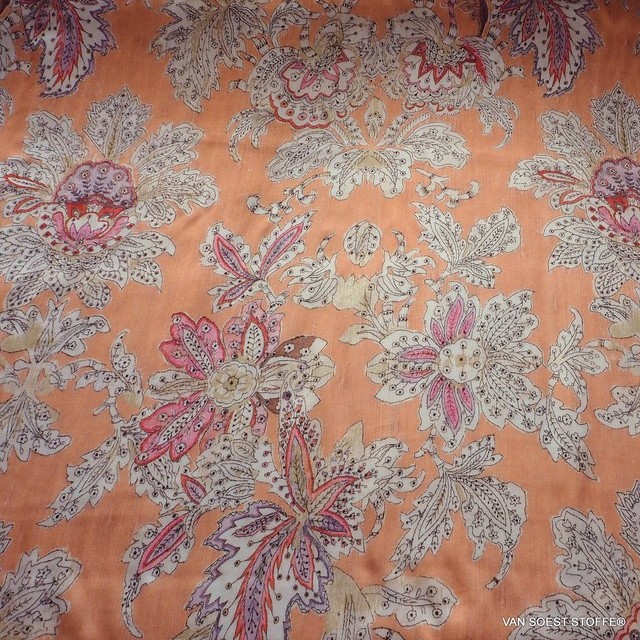 Flower fantasy on salmon viscose with bark effect. | View: Flower fantasy on salmon viscose with bark effect.