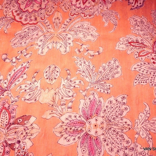 Flower fantasy on salmon viscose with bark effect. | View: Flower fantasy on salmon viscose with bark effect.