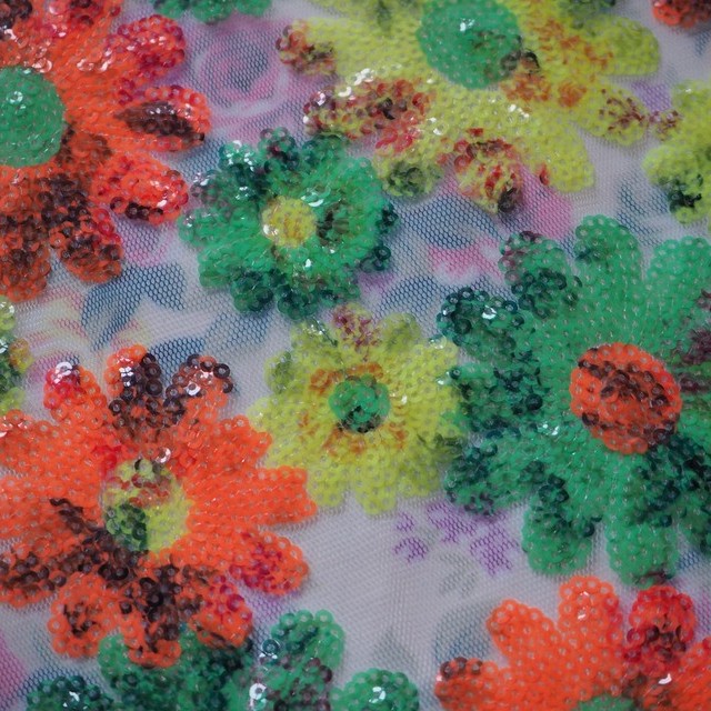 Colourful floral sequins in orange green yellow on printed rose tulle