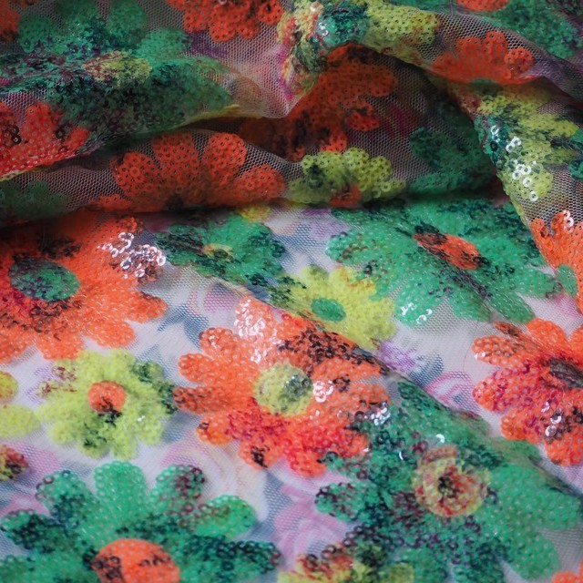 Colourful floral sequins in orange green yellow on printed rose tulle