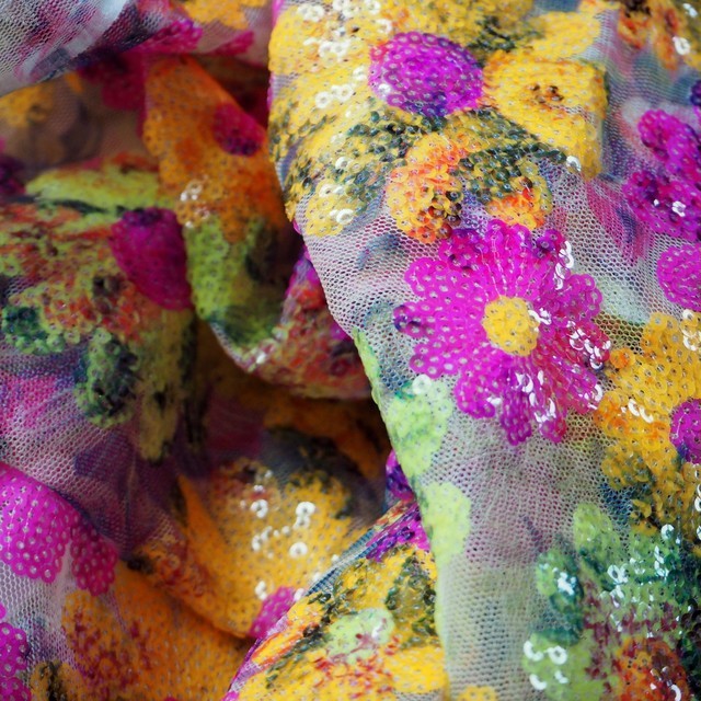 Colorful floral sequins in pink yellow green on printed rose tulle