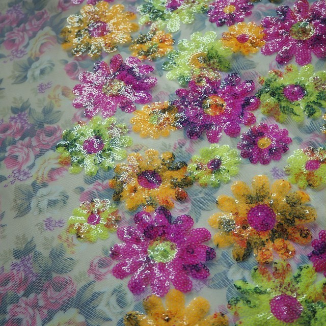 Colorful floral sequins in pink yellow green on printed rose tulle