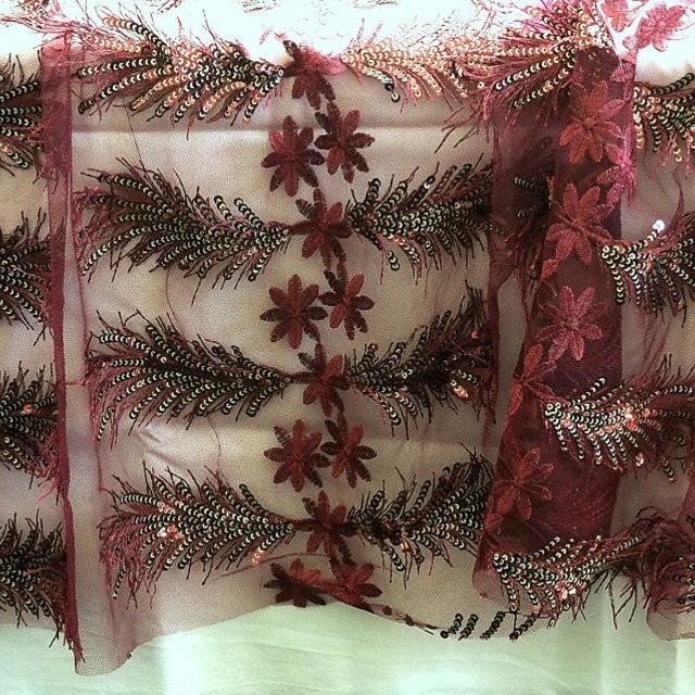Burgundy sequins fringes and flowers fabric on fine tulle | View: Burgundy sequins fringes and flowers fabric on fine tulle