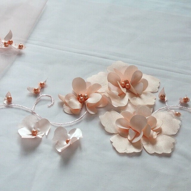 Couture 3D flowers with pearls on tone in tone tulle. | View: Couture 3D flowers with pearls on tone in tone tulle.