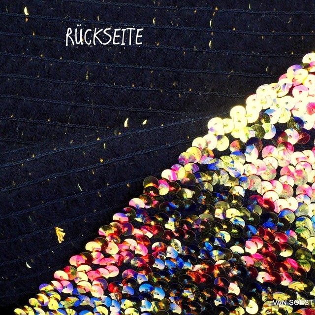 Couture multi color sequins on a soft stretch Elastic. | View: Couture multi color sequins on a soft stretch Elastic.
