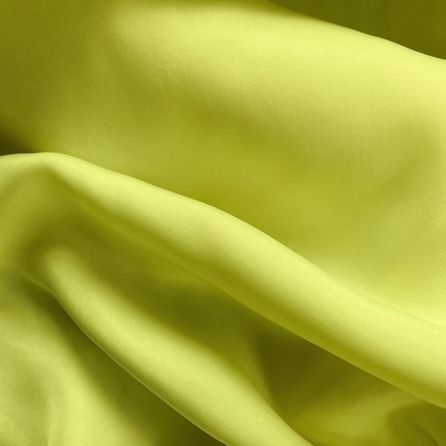 Cupro viscose twill sandwashed in neon yellow | View: Cupro viscose twill sandwashed in color neon yellow