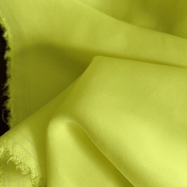 Cupro viscose twill sandwashed in neon yellow | View: Cupro viscose twill sandwashed in color neon yellow