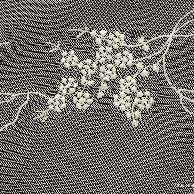 Fluttering fine mini flowers in Ivory on tone on tone tulle