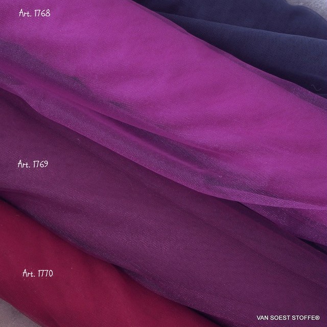 Glitter stretch tulle in color magenta