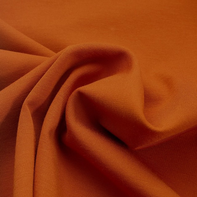 High stretch (bi-elastic) light sheen & medium weight fine jersey rayon mix in orange