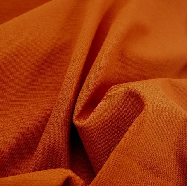 High stretch (bi-elastic) light sheen & medium weight fine jersey rayon mix in orange | View: High stretch (bi-elastic) light sheen & medium weight fine jersey rayon mix in orange