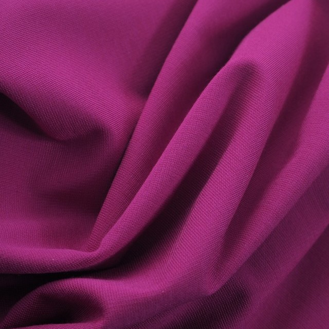 High stretch (bi-elastic) light sheen & medium weight fine jersey rayon mix in magenta