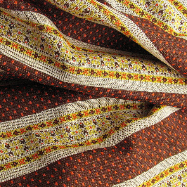 Jersey Stoff als Jacquard in Orange Braun