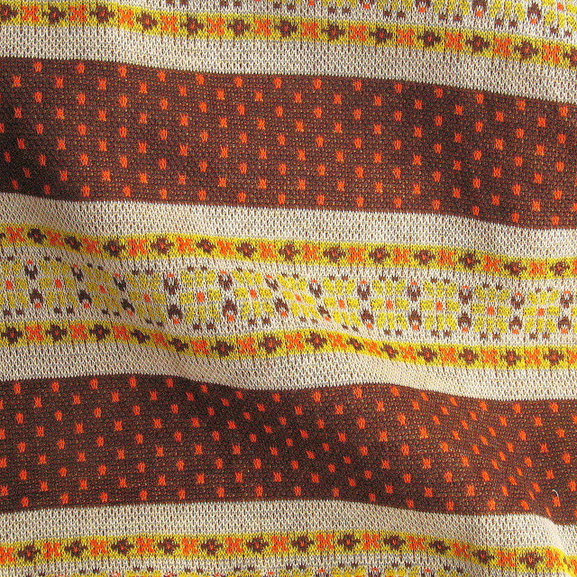 Jersey Stoff als Jacquard in Orange Braun