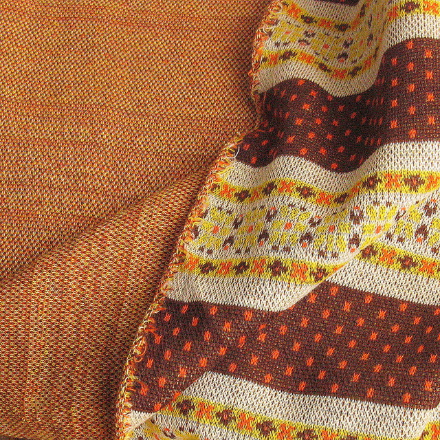 Jersey fabric as Christmas Jacquard in orange brown