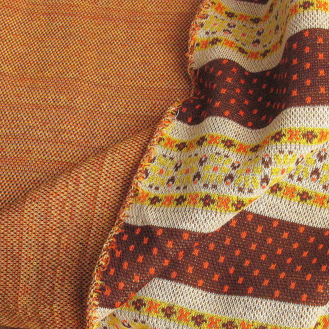 Jersey Stoff als Jacquard in Orange Braun