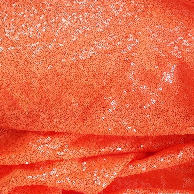 Neon colored mini sequins on tone on tone stretch tulle in orange | View: Neon colored mini sequins on tone on tone stretch tulle in orange