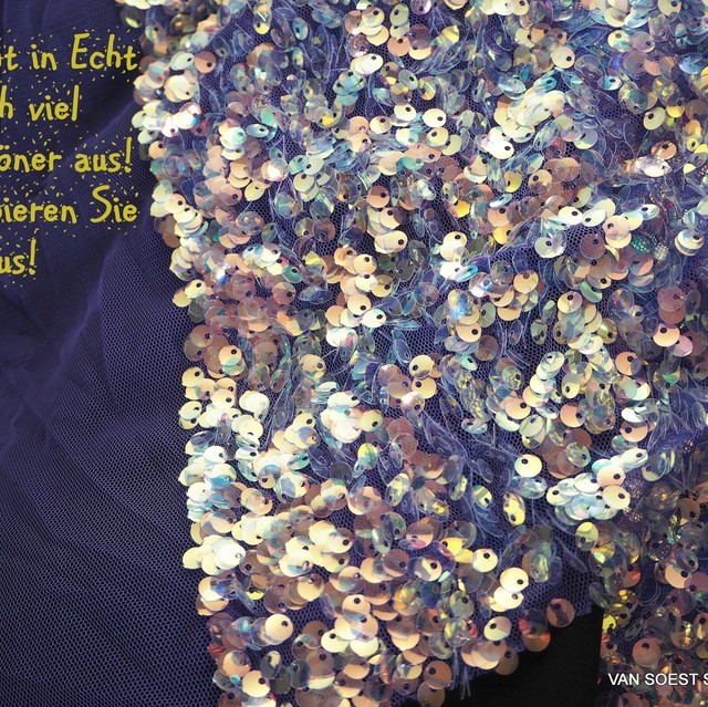 Sequins wonder with iridescent sequins on purple fine tulle