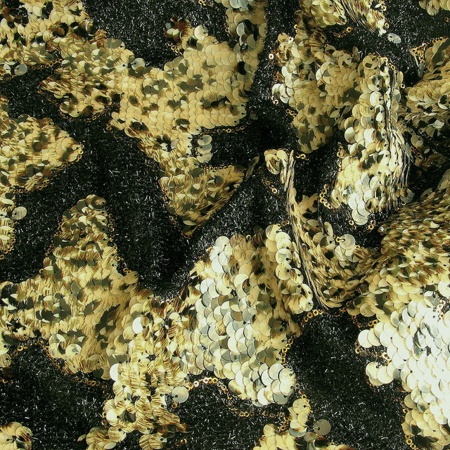 Reptile sequins on black raffia | View: reptile sequins on black raffia