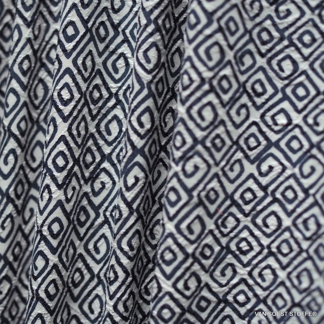 Romeo stretch seersucker printed with navy colored geometric shapes