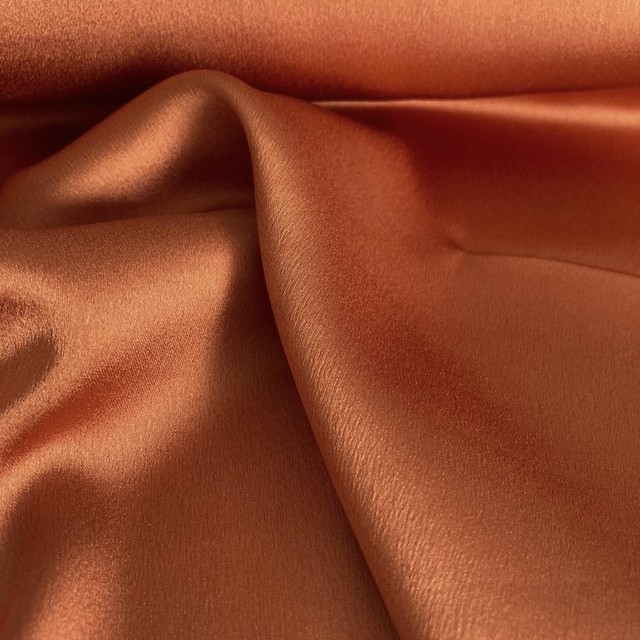 Satin with stretch super light and soft flowing in gold | View: Satin with stretch part super light and soft flowing in brick orange