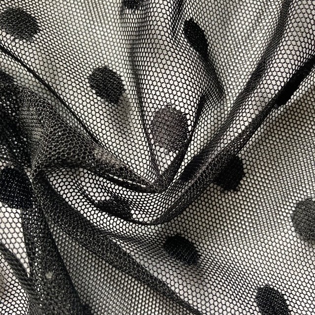 Stretch polka dot jacquard 10mm tulle in the color jet black