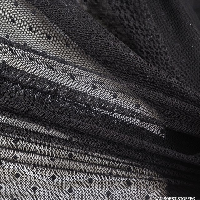 Stretch polka dot jacquard 3mm tulle in the color jet black