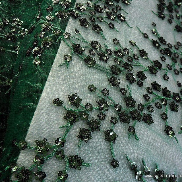 Fir green branches of mini sequins on green colored tulle. | View: Fir green branches of mini sequins on green colored tulle.