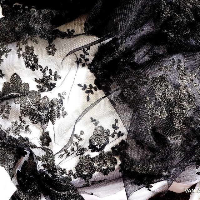 Deep black bow flowers lace on tulle. | View: Deep black flowers / leaves tip