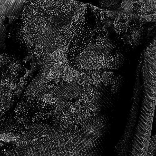 Deep black bow flowers lace on tulle. | View: Deep black bow flowers lace on tulle.