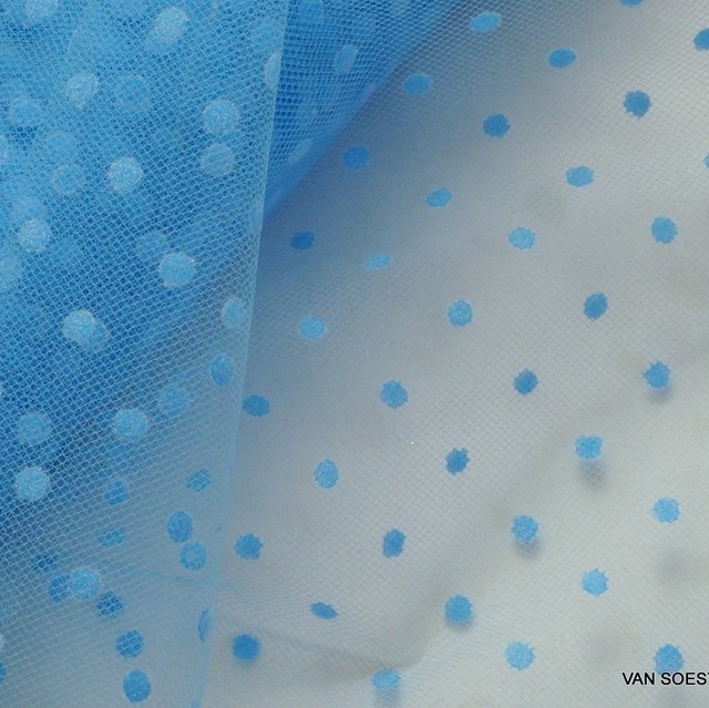 Polka dot flake tone in tone blue tulle.