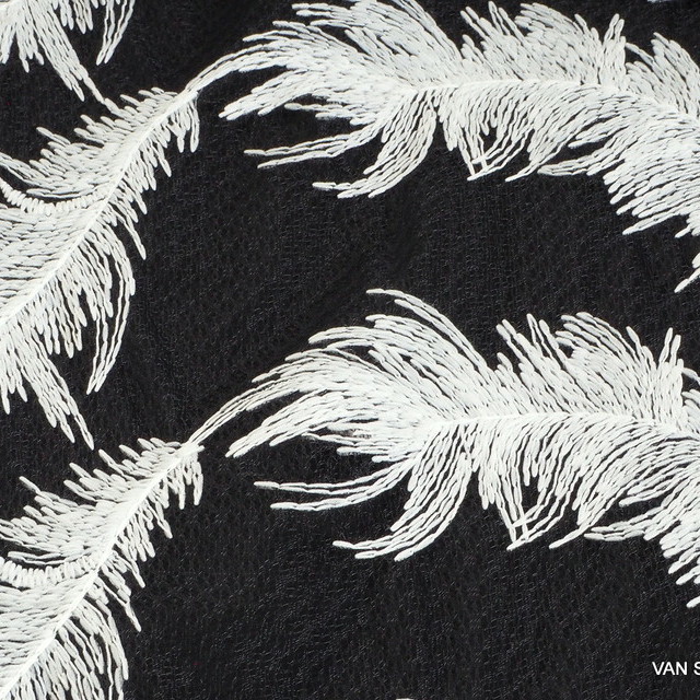 White feathers on black fantasy tulle | View: White feathers on black fantasy tulle