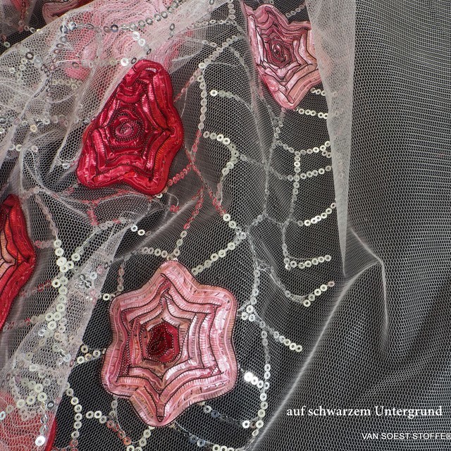 abstract red 3D flowers on a silver sequin net on white tulle