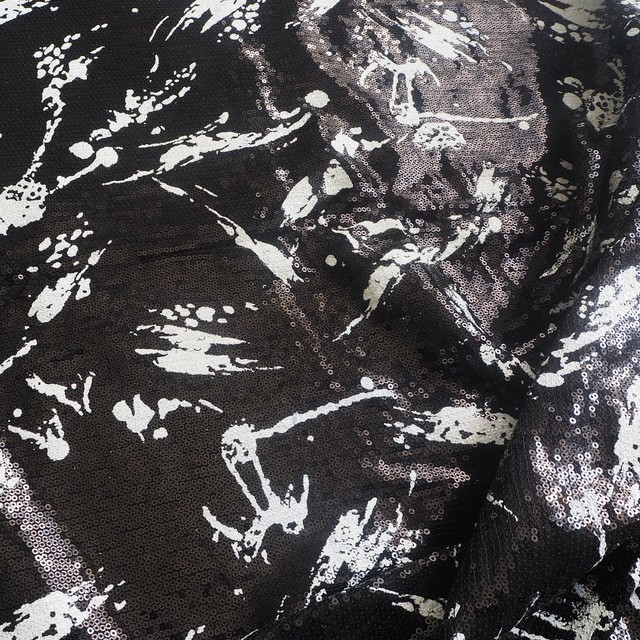 clover printed tulle - sequin fabric slightly transparent color black - white