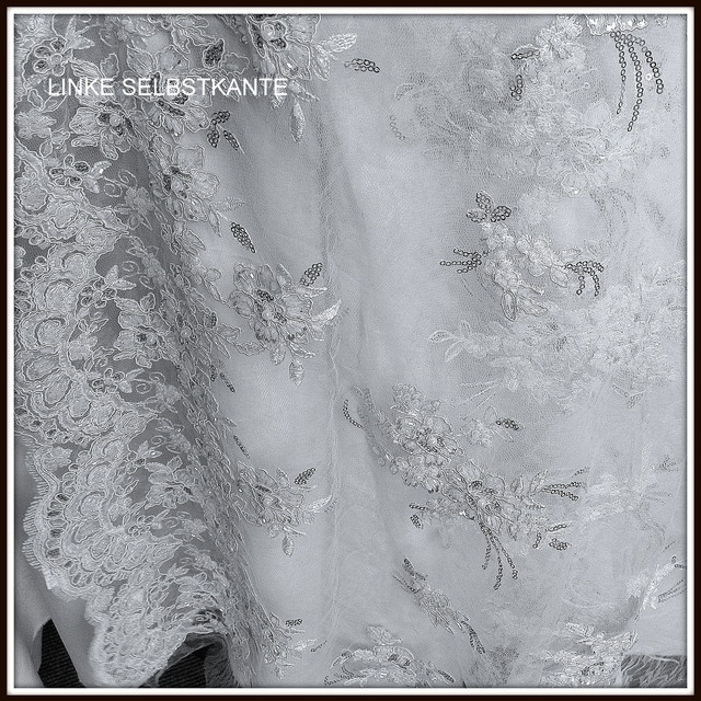 Beaded floral lace with beads + sequins on tulle in cream white.