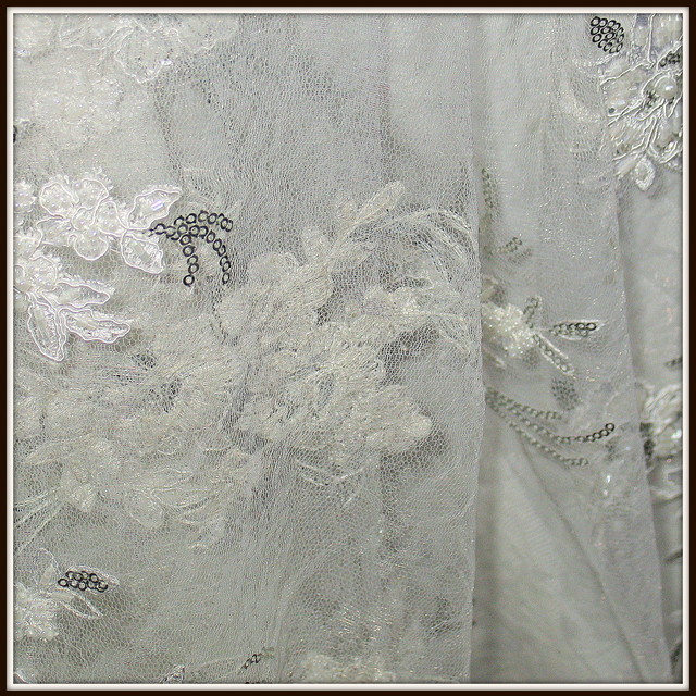 Beaded floral lace with beads + sequins on tulle in cream white.