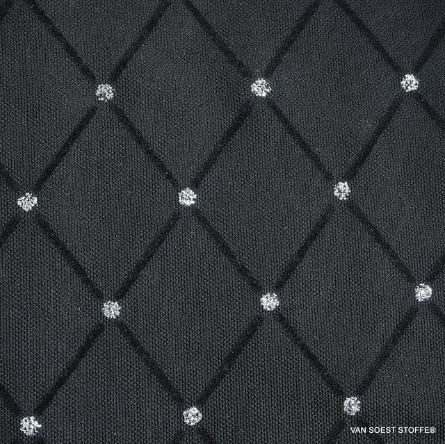schwarzer Rautenflockprint mit silbernen Punkten auf schwarzem Stretch Tüll