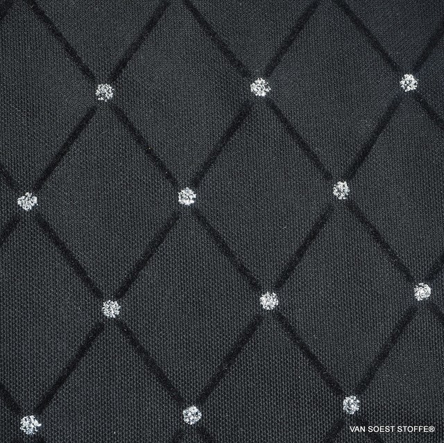 black diamond flock print with silver dots on black stretch tulle