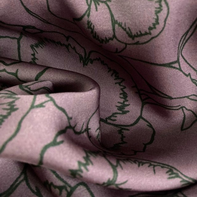 Delicate floral print in green lilac on lightweight rayon mix satin | View: Delicate floral print in green lilac on lightweight rayon mix satin